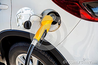 Refill and filling Oil Gas Fuel at station.Gas station - refueling.To fill the machine with fuel Stock Photo