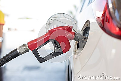 Refill and filling Oil Gas Fuel at station. Gas station refueling. To fill the machine with fuel. Car fill with gasoline at a gas Stock Photo