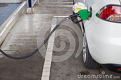 Refill and filling Oil Gas Fuel at station.Gas station - refueling.To fill the machine with fuel Stock Photo