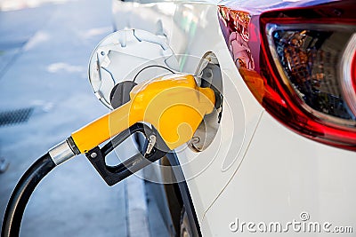 Refill and filling Oil Gas Fuel at station.Gas station - refueling.To fill the machine with fuel Stock Photo