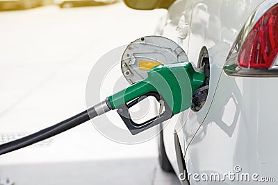 Refill and filling Oil Gas Fuel at station.Gas station - refueling.To fill the machine with fuel Stock Photo