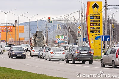 Refills Stand oil company Rosneft with fuel near the road prices with gasoline prices Editorial Stock Photo