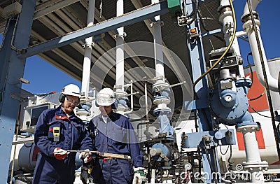 Refinery workers and oil industry Stock Photo