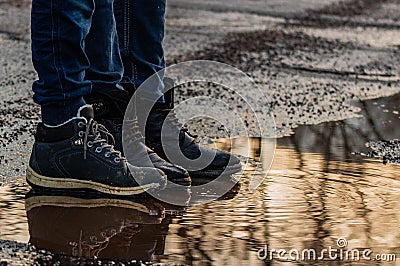 Reflected boots Stock Photo