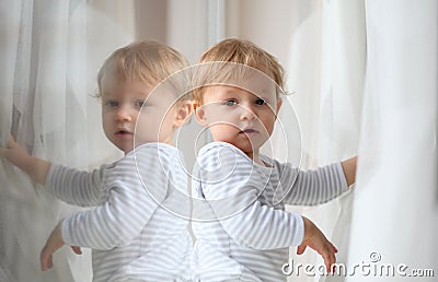 Reflected child Stock Photo