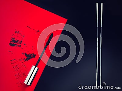 Mascara ona black and red background Stock Photo