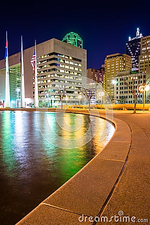 The reflecting pool at City Hall and buildings at night, in Dallas, Texas. Stock Photo