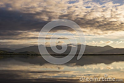 Reflecting Sunset Mount Brandon and Lough Gill Stock Photo