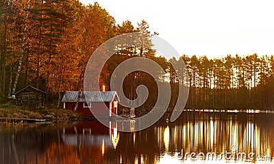 Golden autumn sunrise at lake Ã–je in Dalarna in Sweden Stock Photo