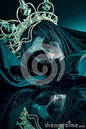 Reflection, dark and fantasy with portrait of queen for evil makeup, fashion and horror art. Creative, mystery and black Stock Photo