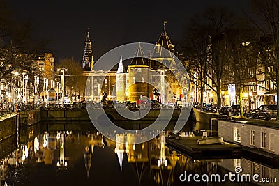 Reflection of De Waag on the Nieuwmarkt square in Amsterdam Editorial Stock Photo