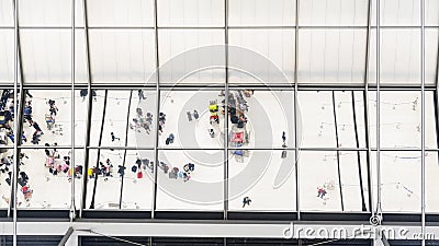 Reflection glass of top view people walk and sit in bench with l Editorial Stock Photo