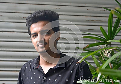 Reflection of happiness in the young man face. free from stressful life. Stock Photo