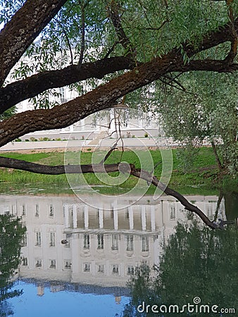 Reflection of historical mansion in town in Russia Stock Photo