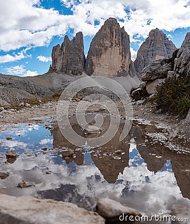 Reflection of the iconic Drei Zinnen mountains in the South Tirolese Dolomite alps Stock Photo