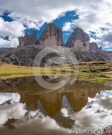 Reflection of the iconic Drei Zinnen mountains in the South Tirolese Dolomite alps Stock Photo