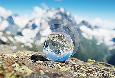 Reflection mountain in the glass ball Stock Photo