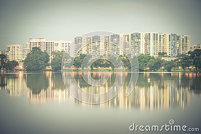 Reflection of new estate HDB housing complex on Jurong Lake, Sin Stock Photo