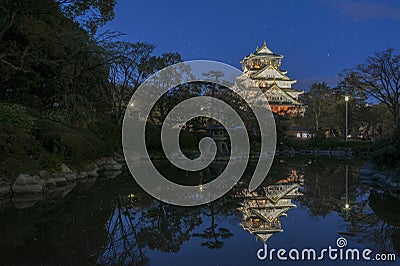 Reflection of osaka castle Stock Photo