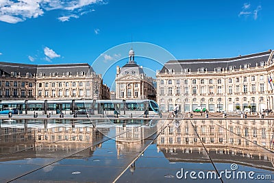 Reflection of Place De La Bourse and tramway in Bordeaux, France. Unesco World Heritage Site Editorial Stock Photo