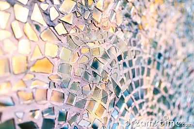 Reflection of the setting sun in the mirror pieces of glass mosaic - abstract background - shallow depth of field Stock Photo