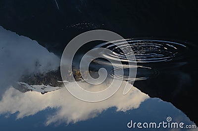 Reflection of snow-capped mountain in Franz Josef, New Zealand Stock Photo