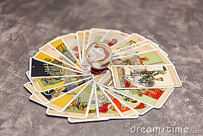 Reflection of tarot cards through magic ball on fortune teller desk Stock Photo