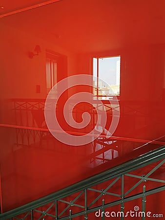 Reflection of a window on a red glossy wall. Stock Photo