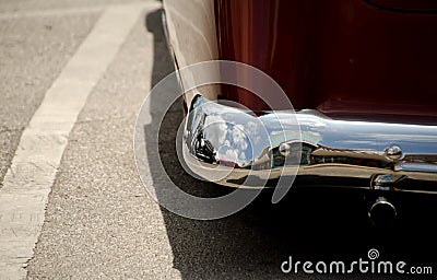 Reflections in chrome details of of exterior of a classic car - Stock Photo