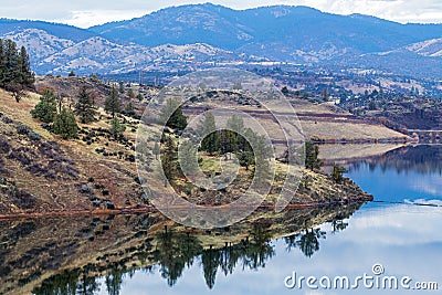 Reflections in the Iron Gate Lake Reservoir near Hornbrook, California, USA Stock Photo