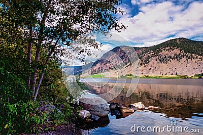 Reflections in Nicola Lake, British Columbia Stock Photo