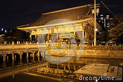 Reflections at night of Rokujidou Hall in Shitennoji Temple in O Stock Photo