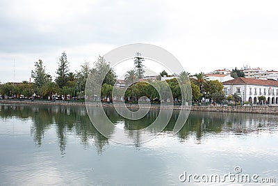 Reflections in the river running through the city Editorial Stock Photo