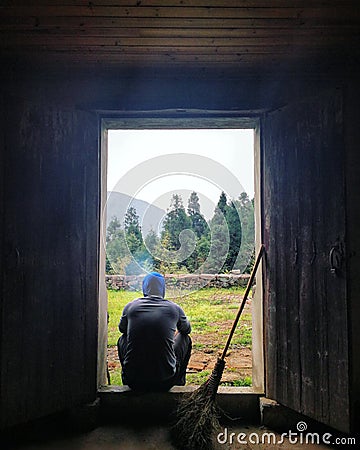 Reflective farmer Stock Photo