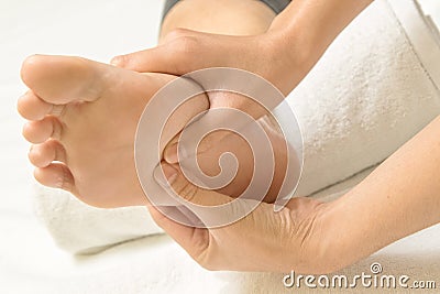 Reflexology foot massage Stock Photo