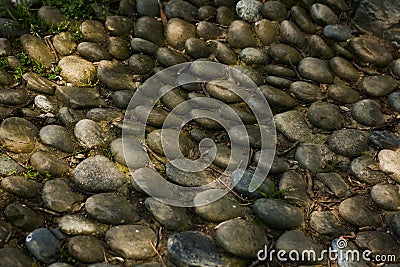 Reflexology massage area or a place provided by the advice for visitors to the lake park. Massage your feet by stepping Stock Photo