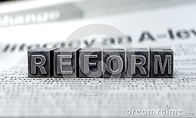 Reform concept,dice text Stock Photo