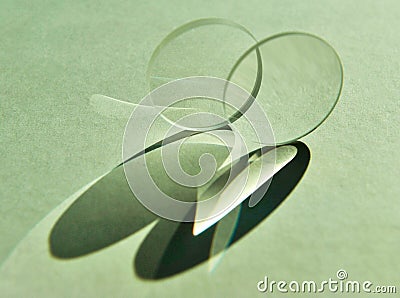 Refraction and reflection of natural light through convex lens. Stock Photo