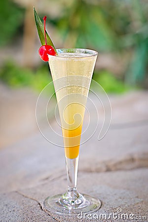 Refreshing alcoholic tropical cocktail ,,Belini Stock Photo