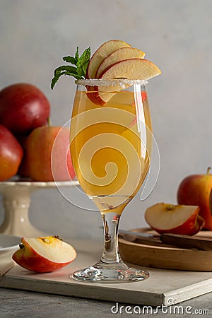 Refreshing apple cocktail drink with fresh red apples Stock Photo