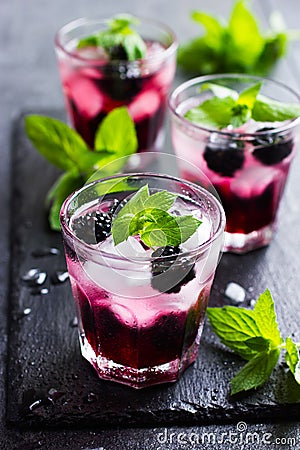 refreshing cocktail with backberry, ice and mint, Stock Photo