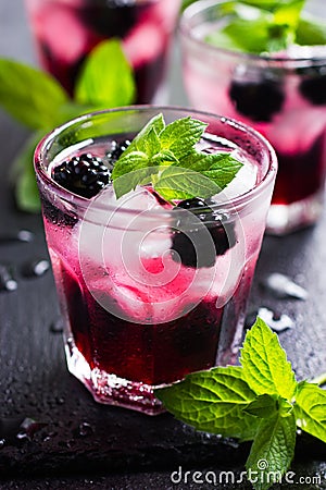 Refreshing cocktail with blueberry, ice and mint, Stock Photo