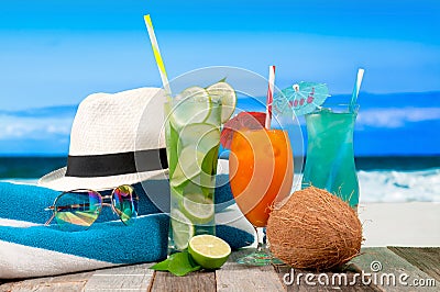 Refreshing cocktail and mojito on beach table. Vacation at Paradise Stock Photo