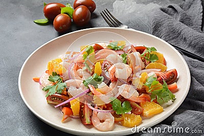 Refreshing dish of fish in citrus juice. Peruvian shrimp, prawn Ceviche marinated in oranges and lime. Stock Photo