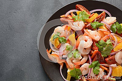 Refreshing dish of fish in citrus juice. Peruvian shrimp, prawn Ceviche marinated in oranges and lime. Stock Photo