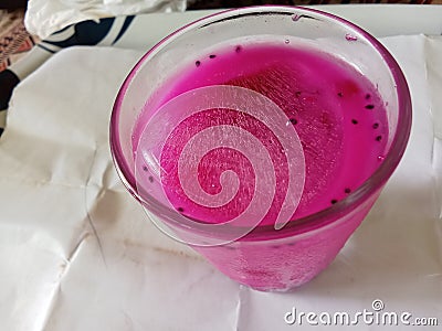 Refreshing pink iced juice in a glass Stock Photo