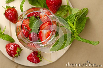 Refreshing strawberry water or lemonade decorated with mint Stock Photo