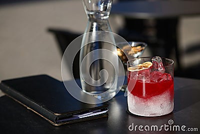 Refreshing summer cocktail with ice cubes and frosted glass Stock Photo