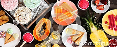 Refreshing summer foods table scene top down view Stock Photo