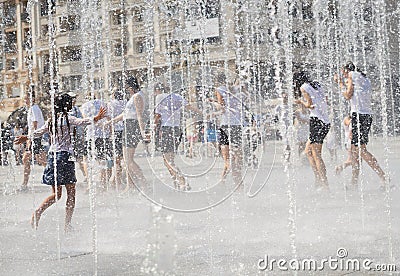 Refreshment in city fountain Editorial Stock Photo